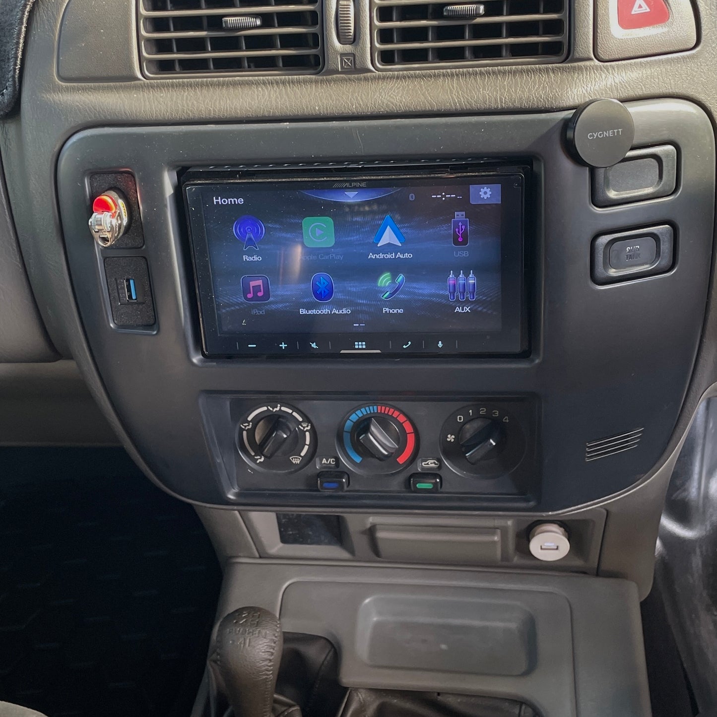 Nissan Patrol GU Series 3 USB pass through mount installed to radio surround