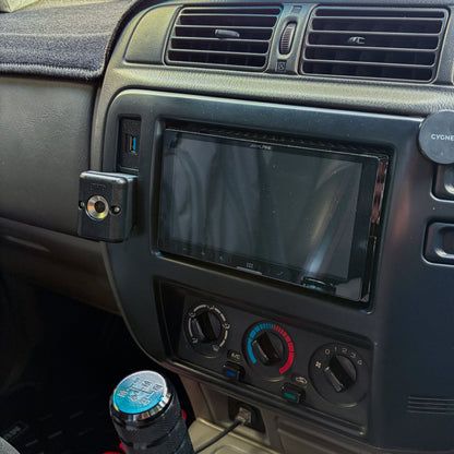 Nissan Patrol GU Series 1-3 UHF mount installed to GU Patrol radio trim installed in car right angled view