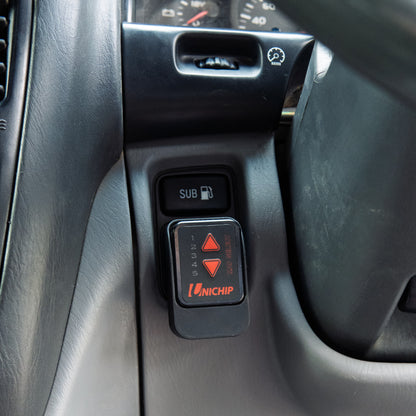 Landcruiser Unichip mount installed to 100 105 series Landcruiser in car close up