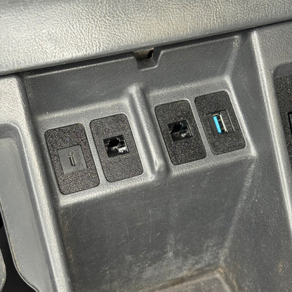 Nissan Patrol GQ USB and UHF pass through mounted to centre console close up