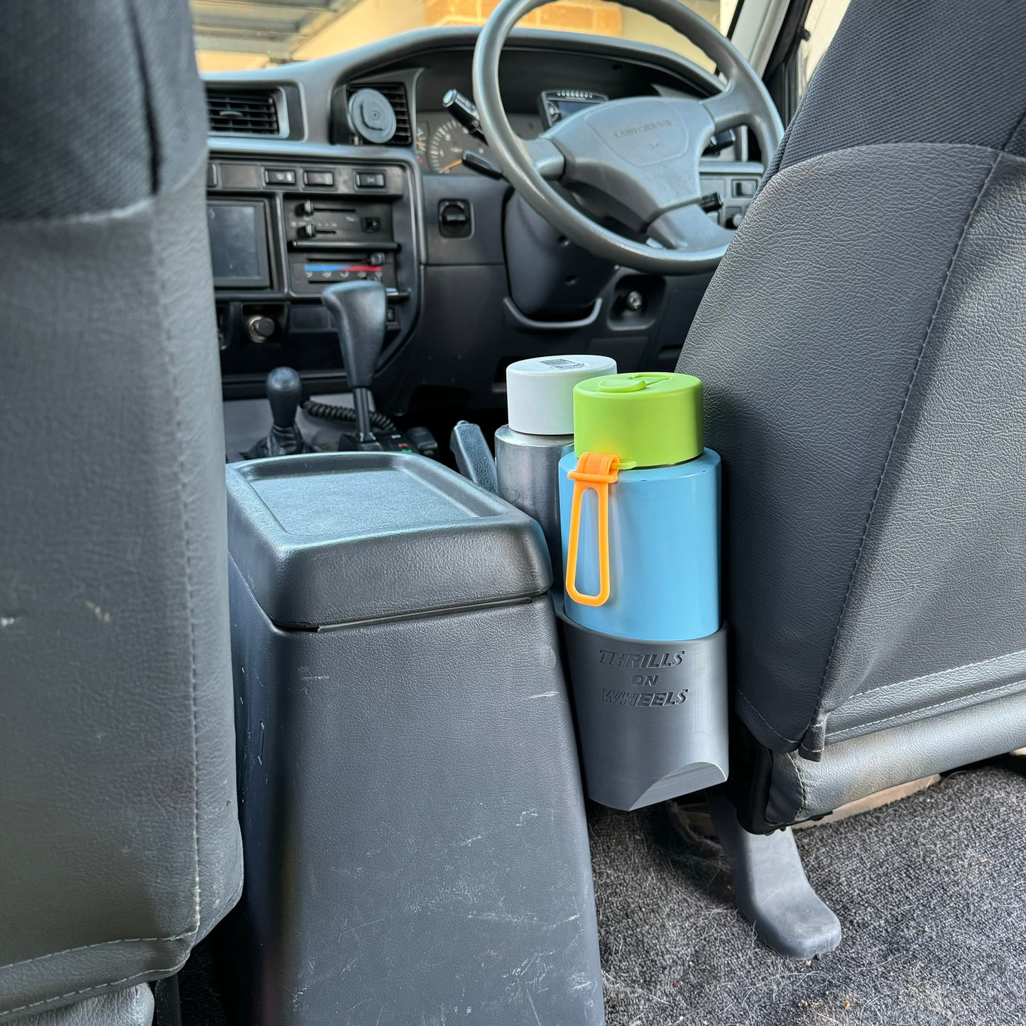 Toyota Landcruiser 80 Series grey large double cup holder in car rear view