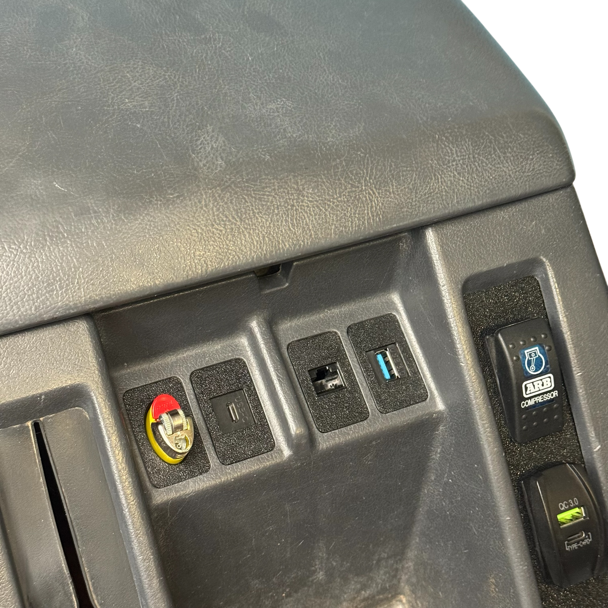 Nissan Patrol GQ Ford Maverick centre console top view showing bic lighter holder installed