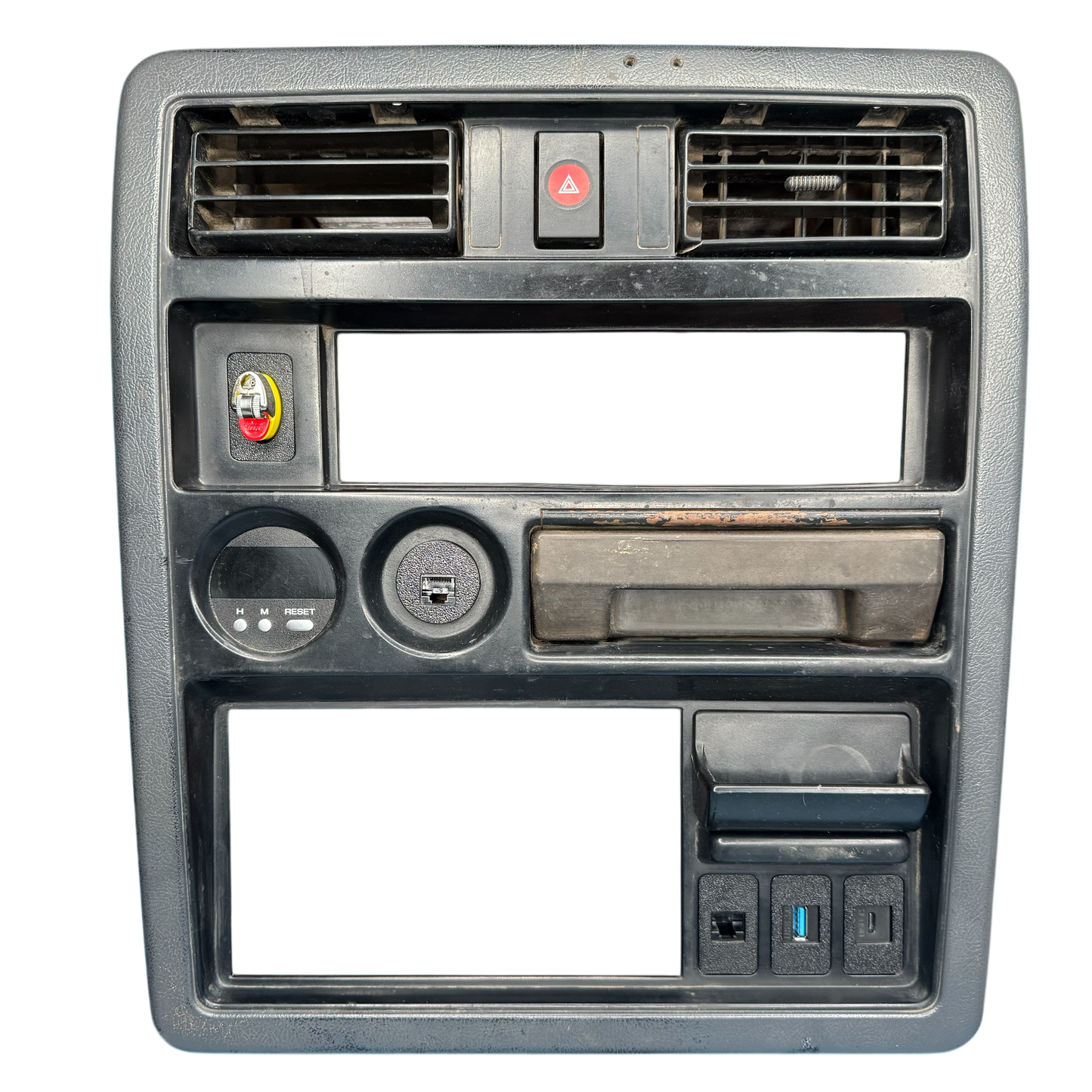 Nissan Patrol GQ radio surround showing bicl ighter holder installed