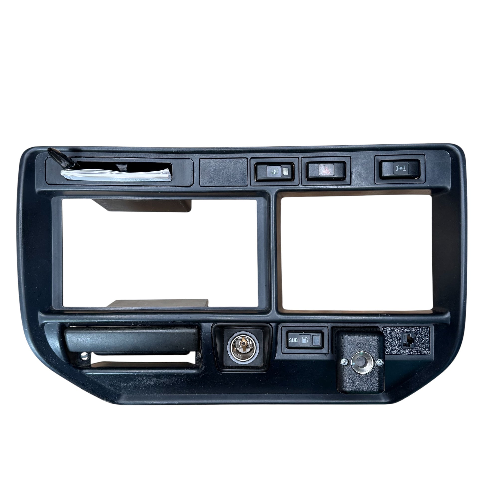 Toyota landcruiser 80 series club permit logbook storage holder installed to radio surround trim out of car